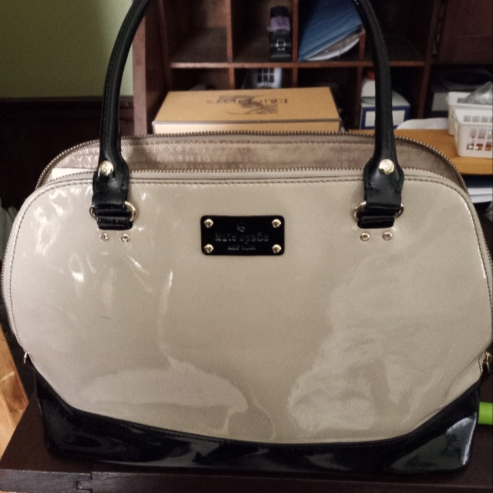 Roomy Kate spade bag, 14.5w x5.25d x11h. Cream and black patent.